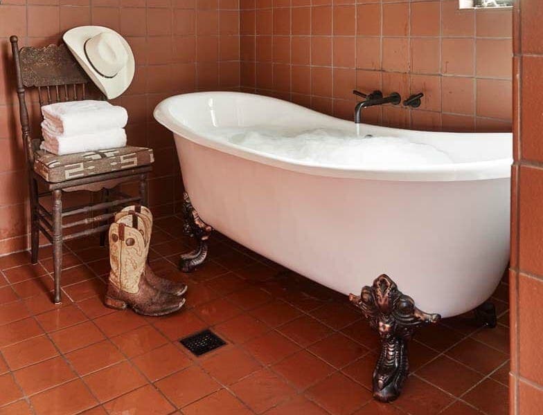 turner house bath tub full of water and bubbles