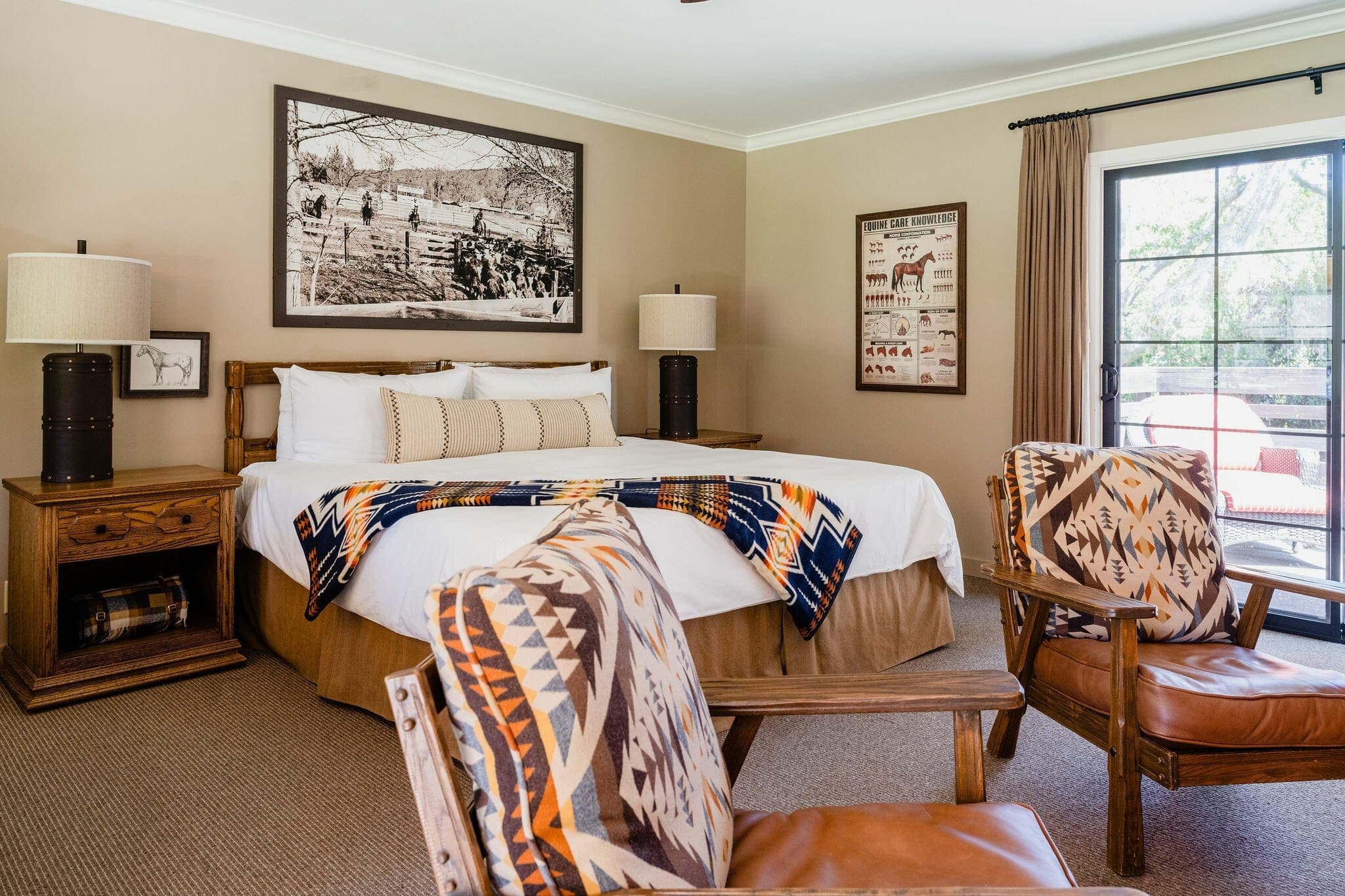 view of seating area and bed inside golf view cottage