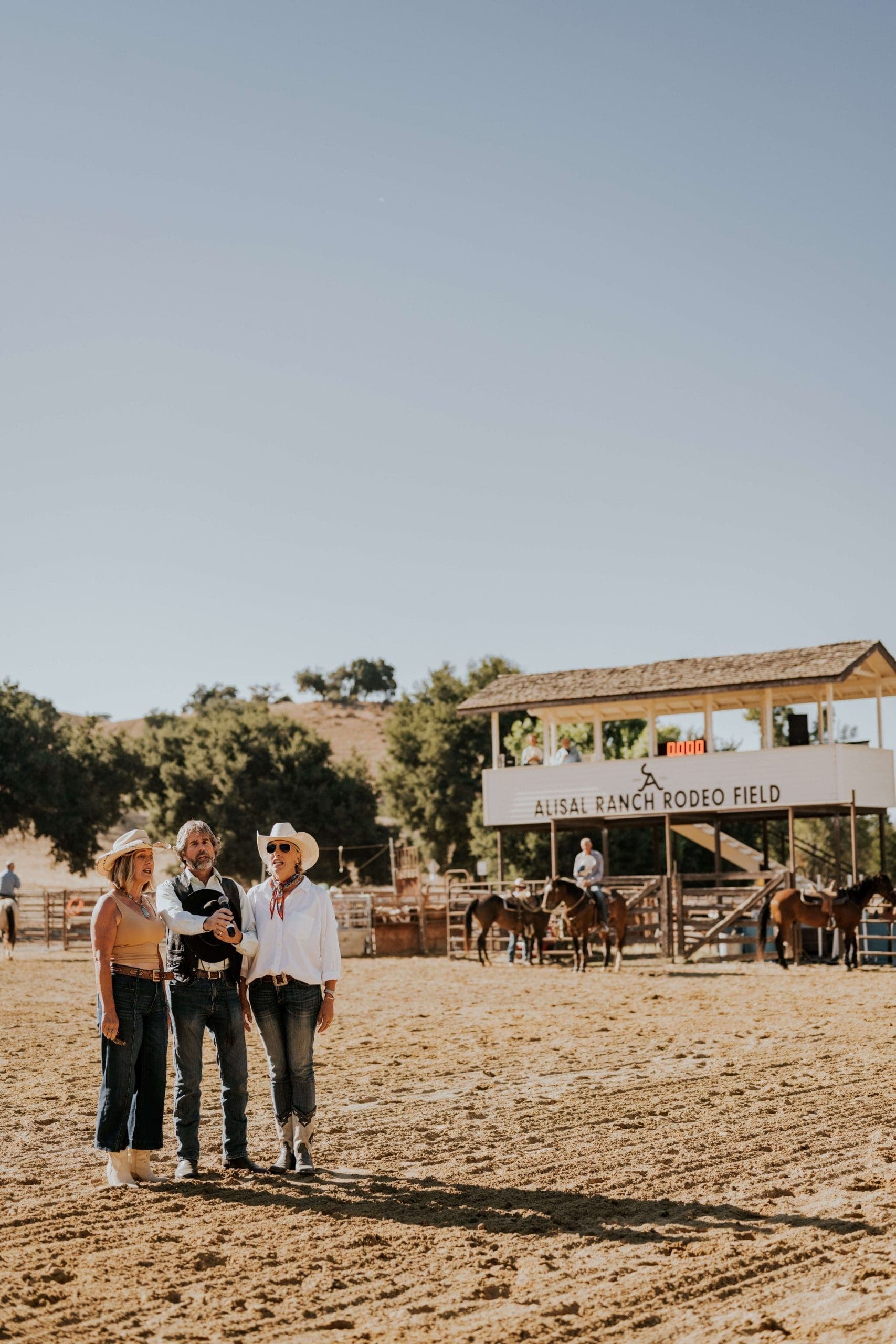 people standing in the Alisal Ranch Rodeo Field