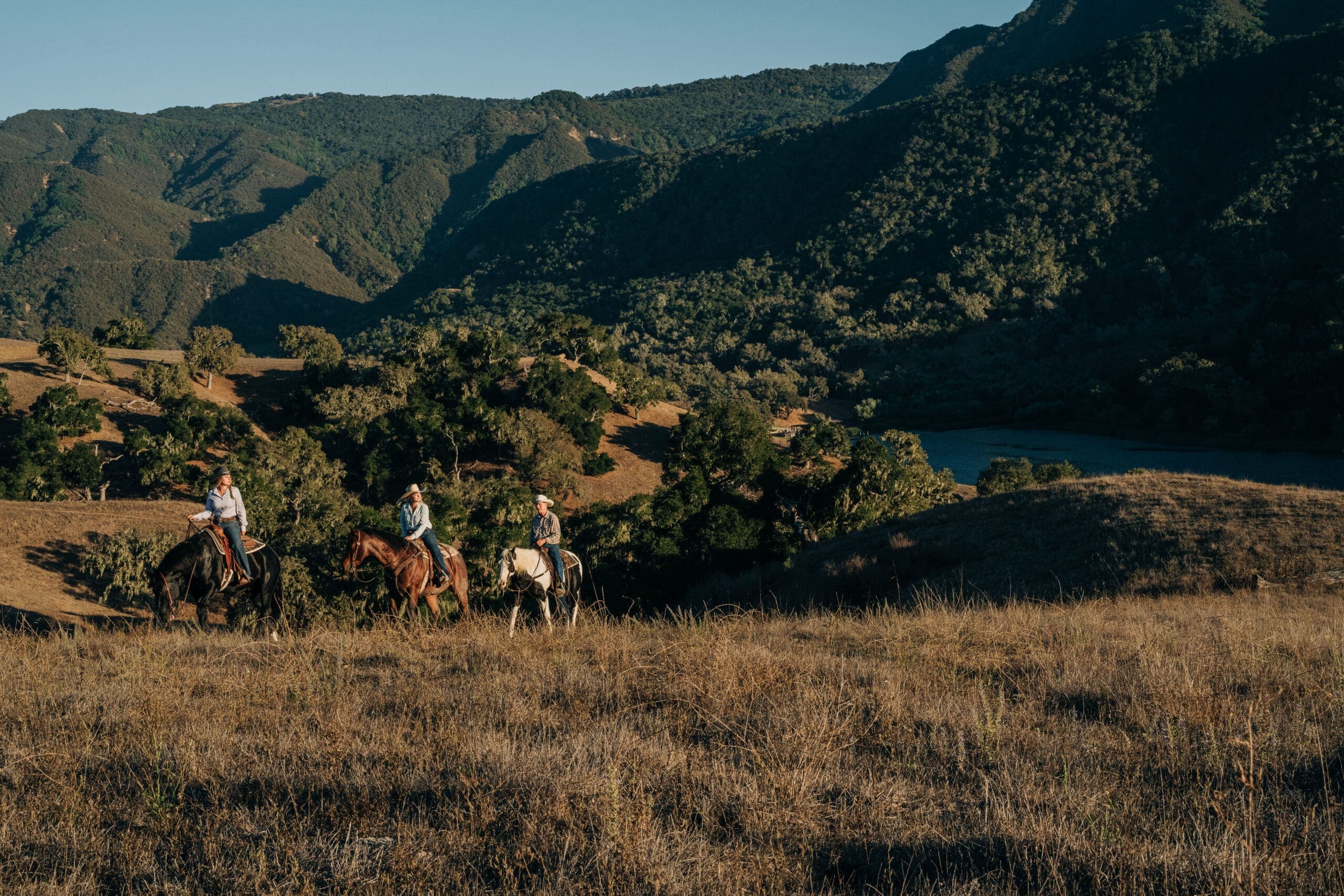 Group horseback riding at Alisal Lake