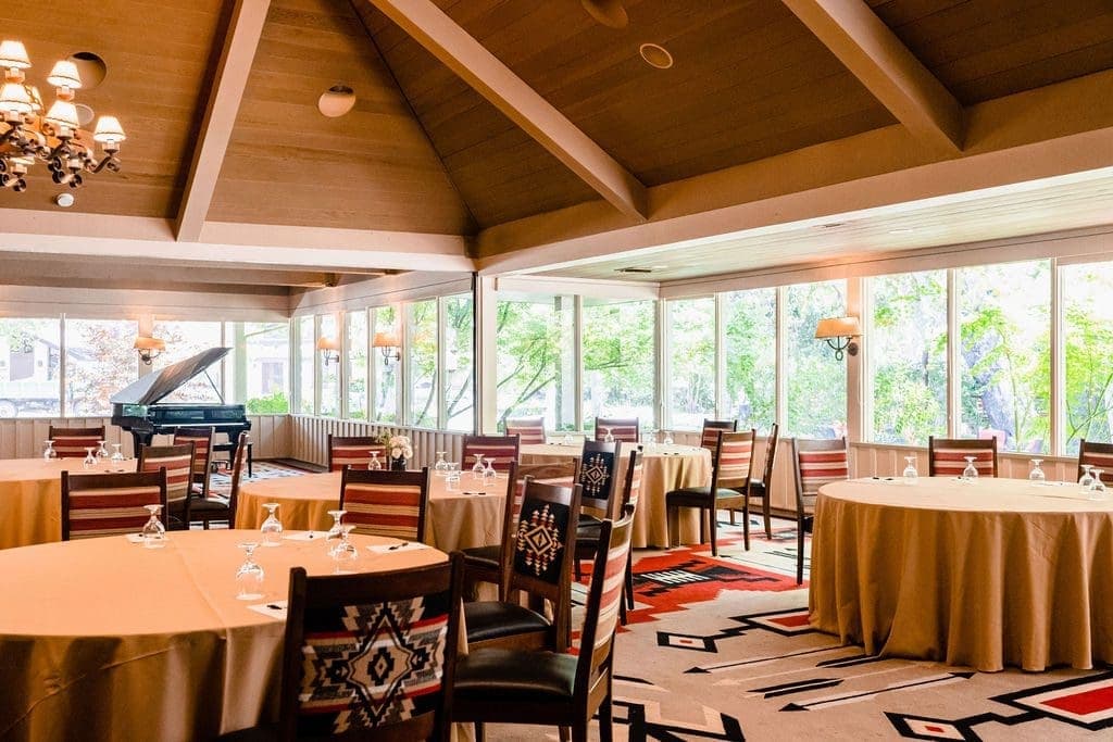 dining room area with grand piano