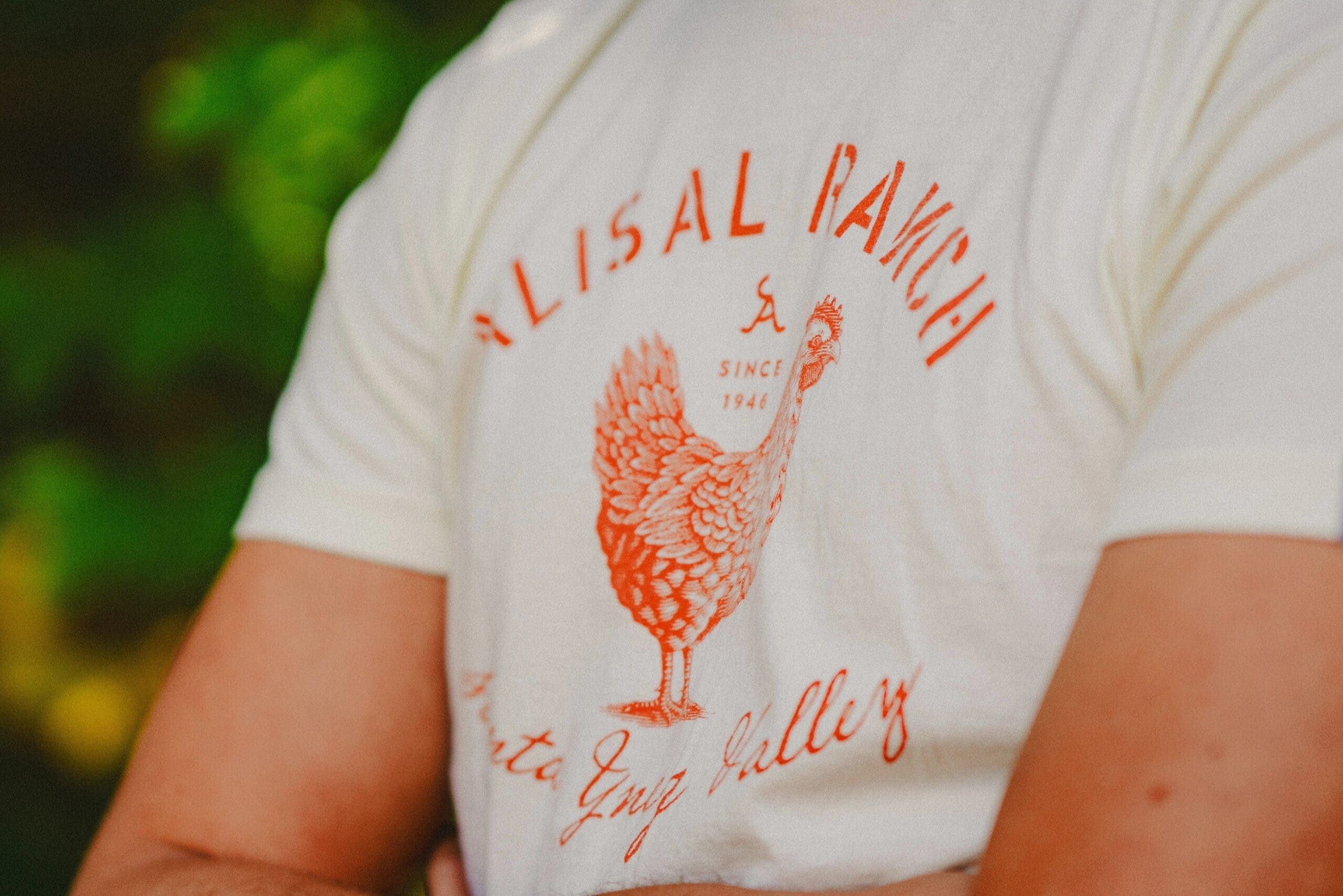 person wearing tshirt that says alisal ranch and has image of a turkey