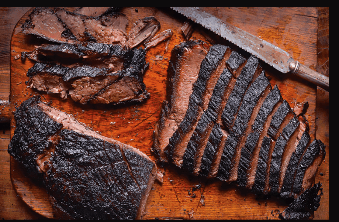 nicely cut slab of beef on a cutting board