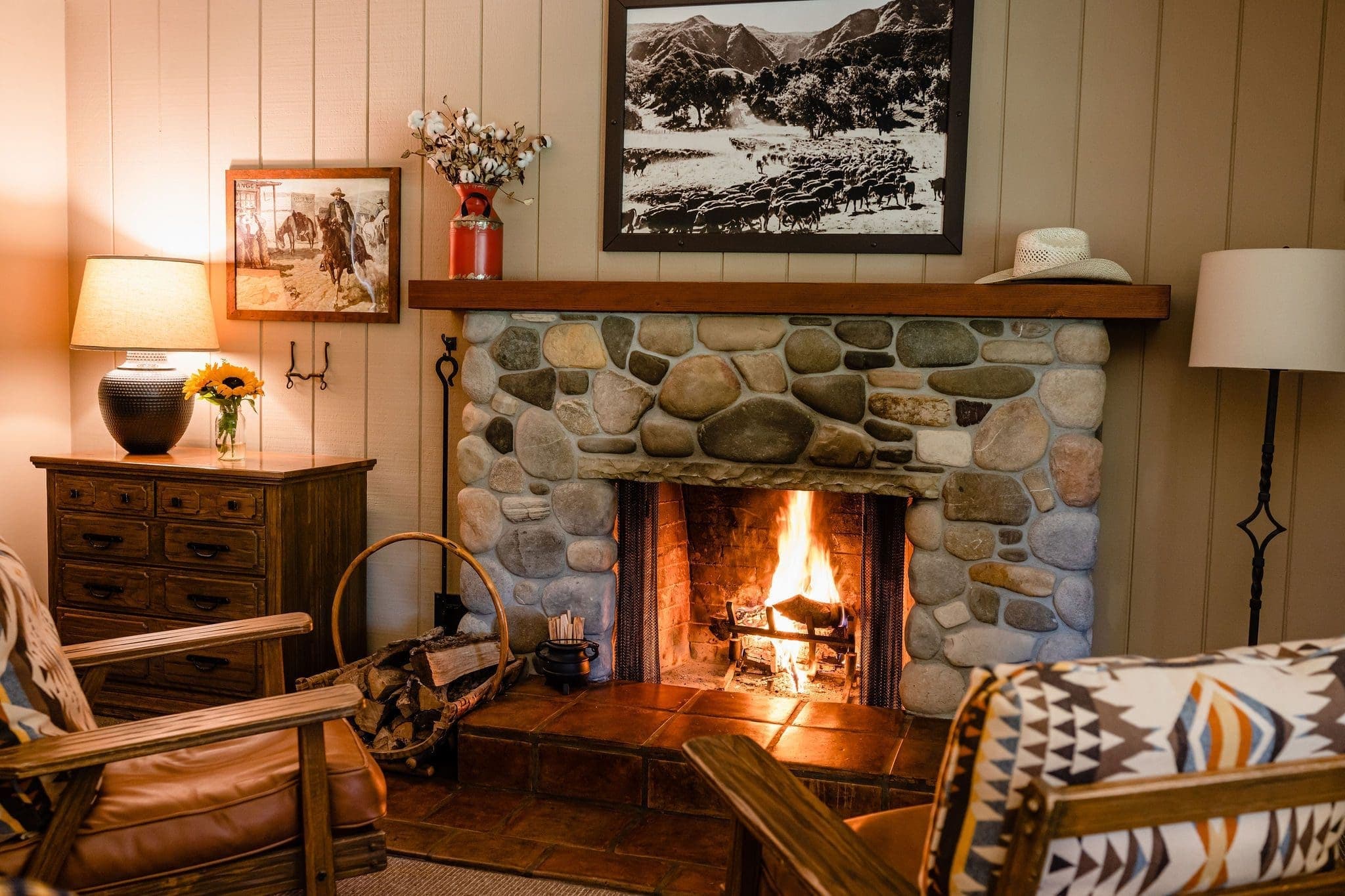 seating area by a lit fireplace