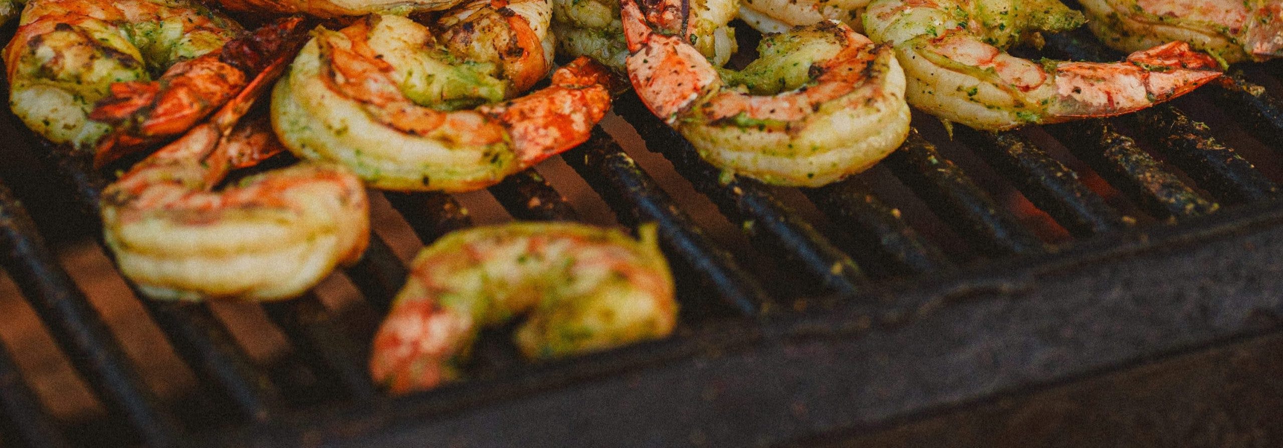 close view of shrimp on a grill